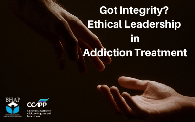 an image of two hands, one on the top of the image and one on the bottom, reaching out to each other. Text reads 'Got Integrity? Ethical Leadership in Addiction Treatment'