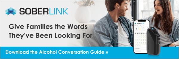 a white man and a white woman sitting on a couch talking to each other. The Soberlink device is in front of them. 'Soberlink: Give Families \the Words They've Been Looking For. Download the Alcohol Conversation Guide >>'
